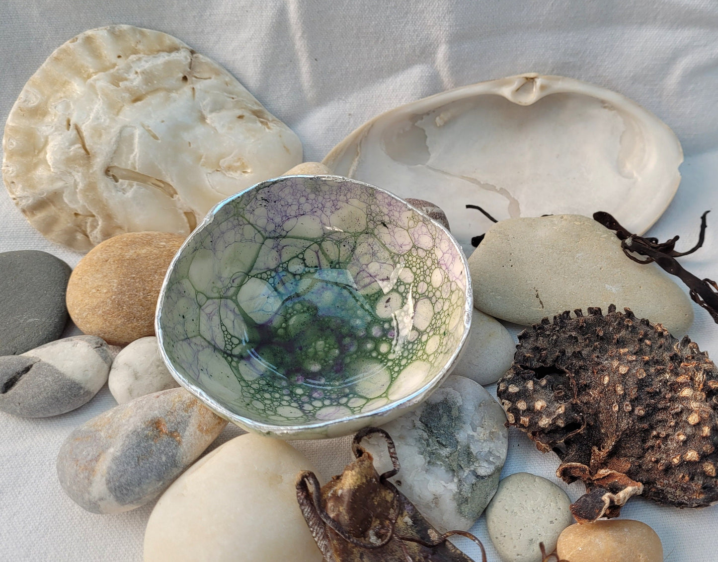 Trinket dish with green and purple bubble glaze