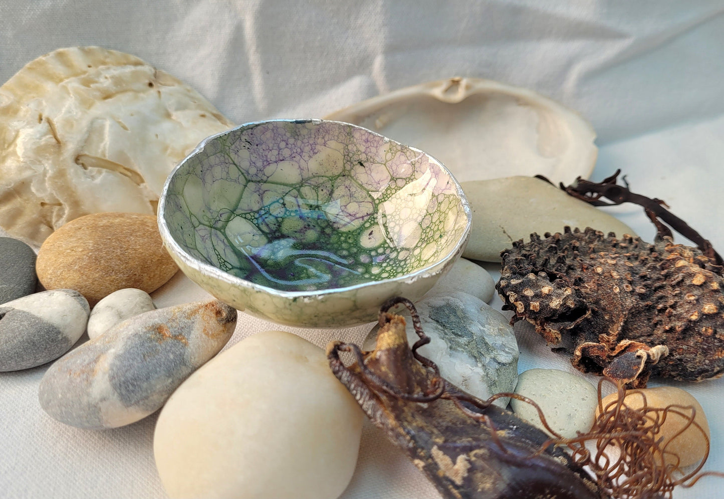 Trinket dish with green and purple bubble glaze