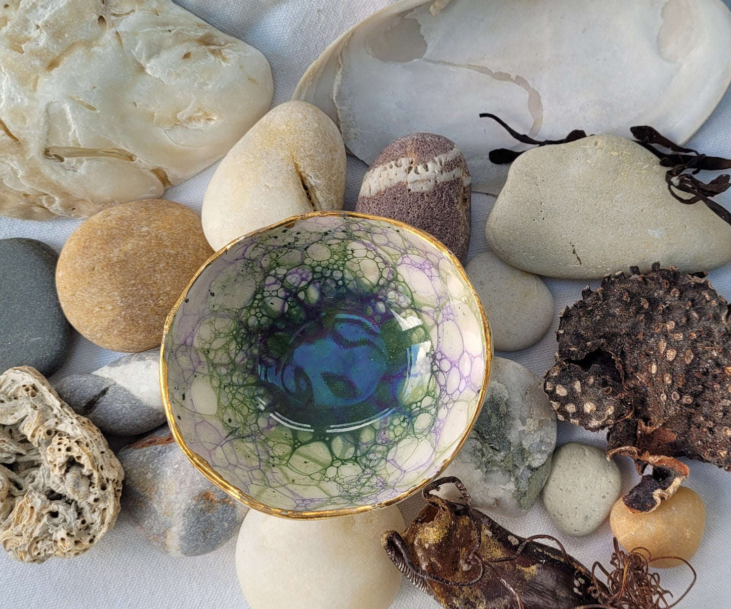 Trinket dish with green and purple bubble glaze